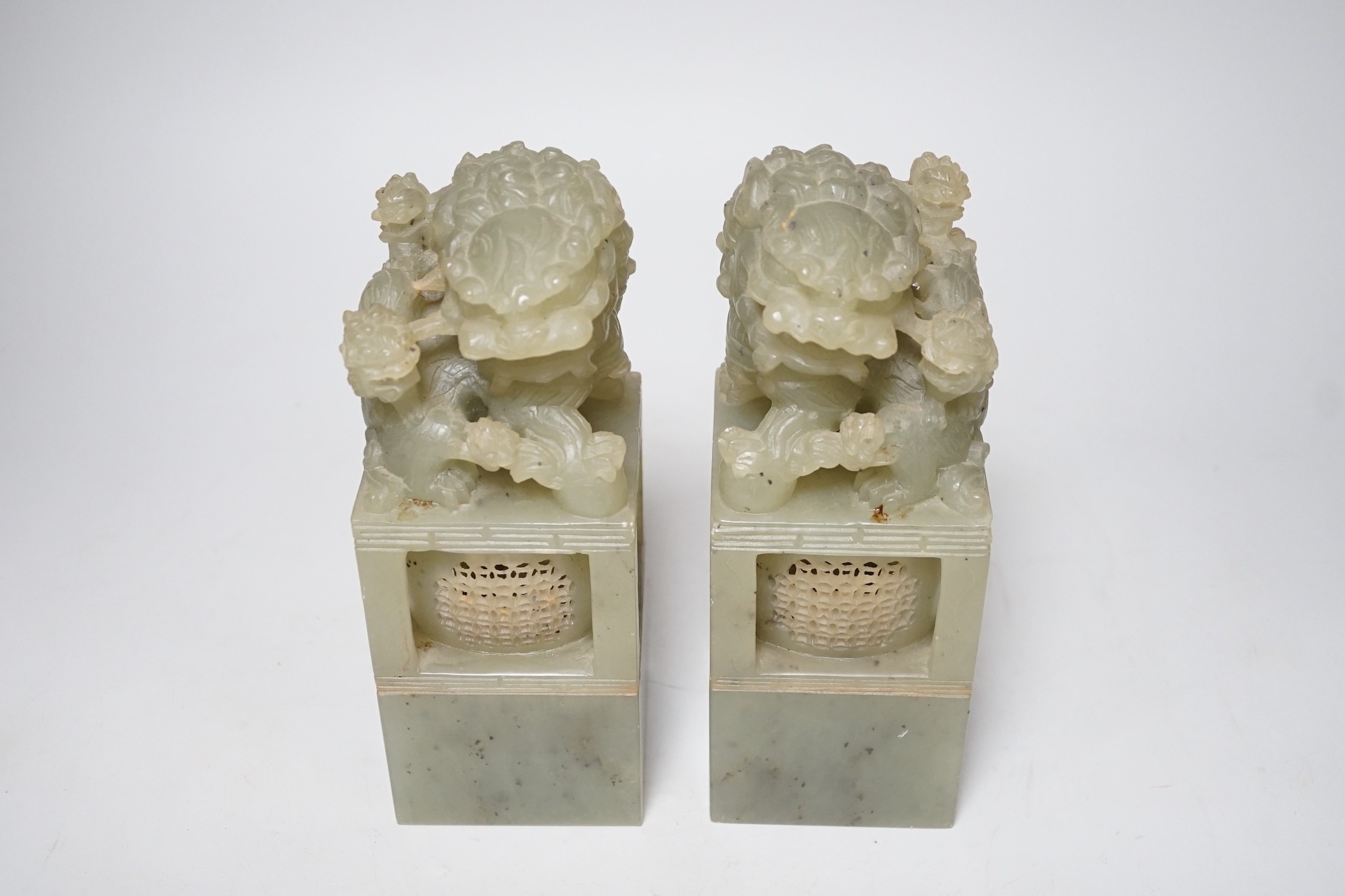 A pair of large Chinese soapstone ‘Temple Guardian lion’ seals, 21cm